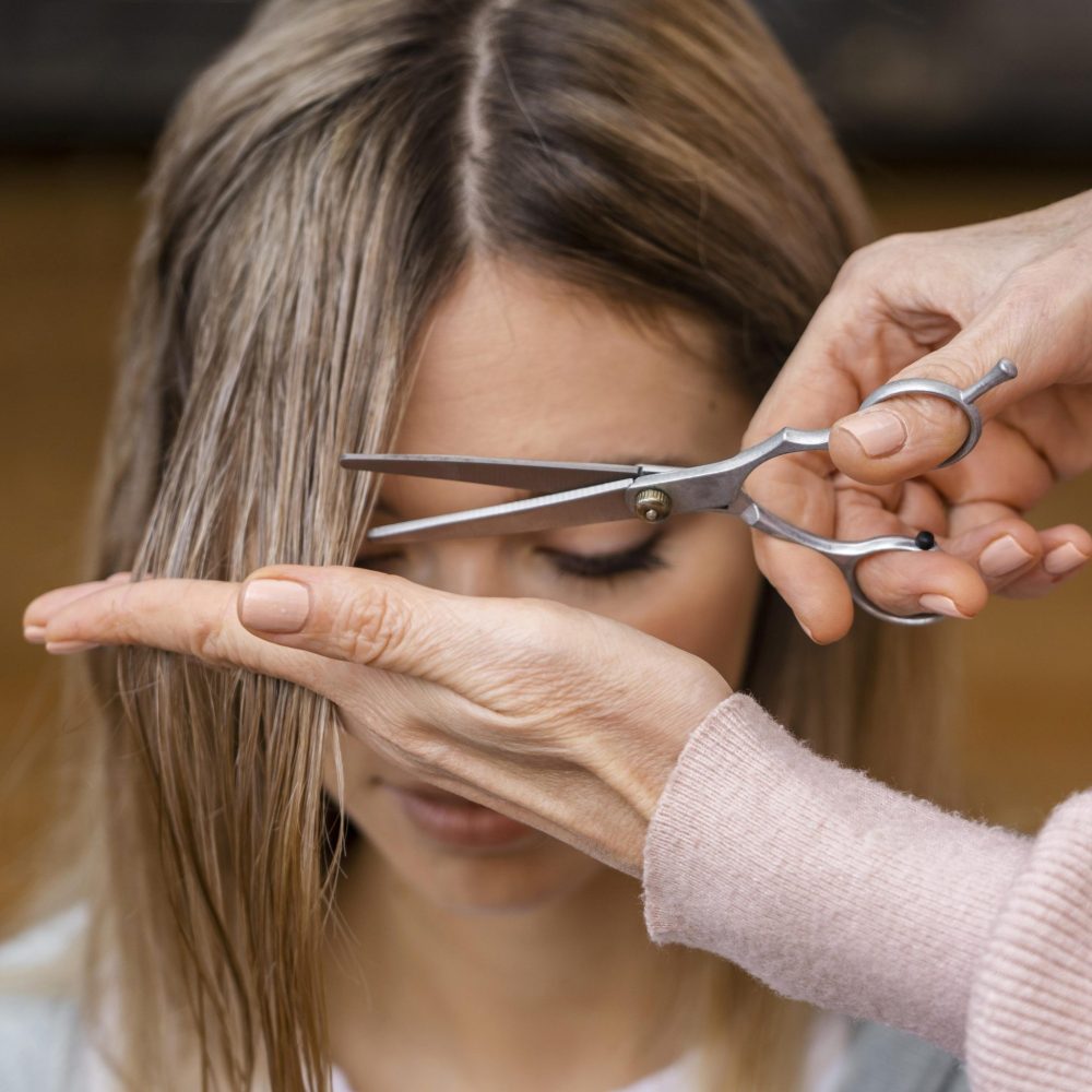 front-view-woman-getting-haircut (1)